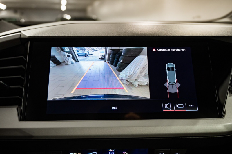 Parking system rear with sensors in back on Audi Q4 e-tron combined with reversing camera
